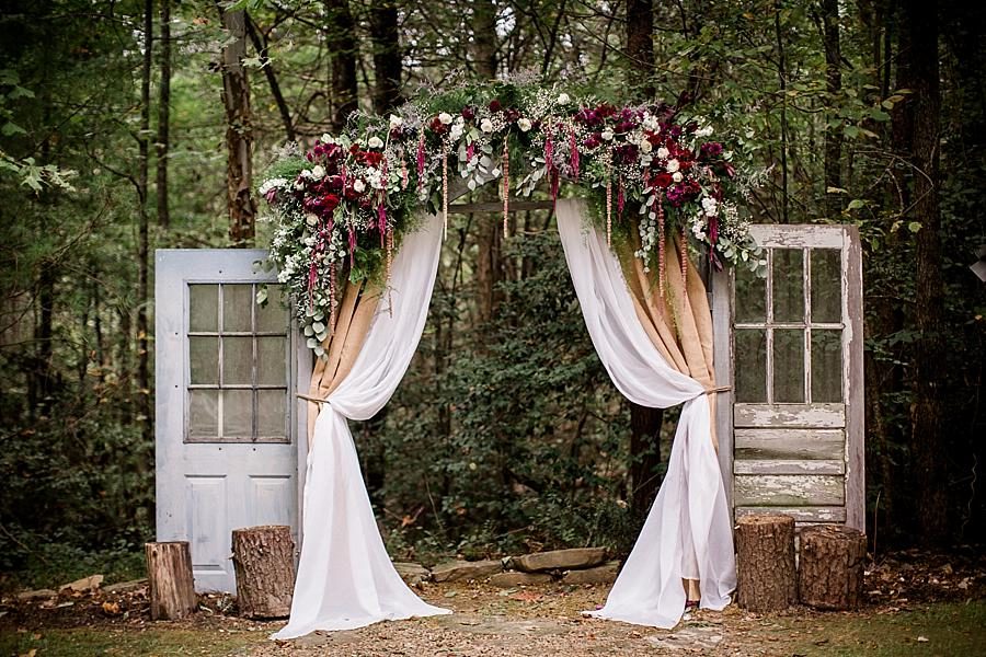 Flower arch at this Sampson's Hollow Fall Wedding by Knoxville Wedding Photographer, Amanda May Photos.
