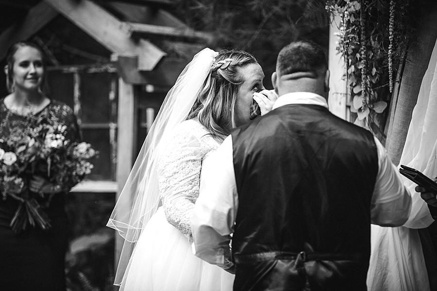 Wiping tears at this Sampson's Hollow Fall Wedding by Knoxville Wedding Photographer, Amanda May Photos.