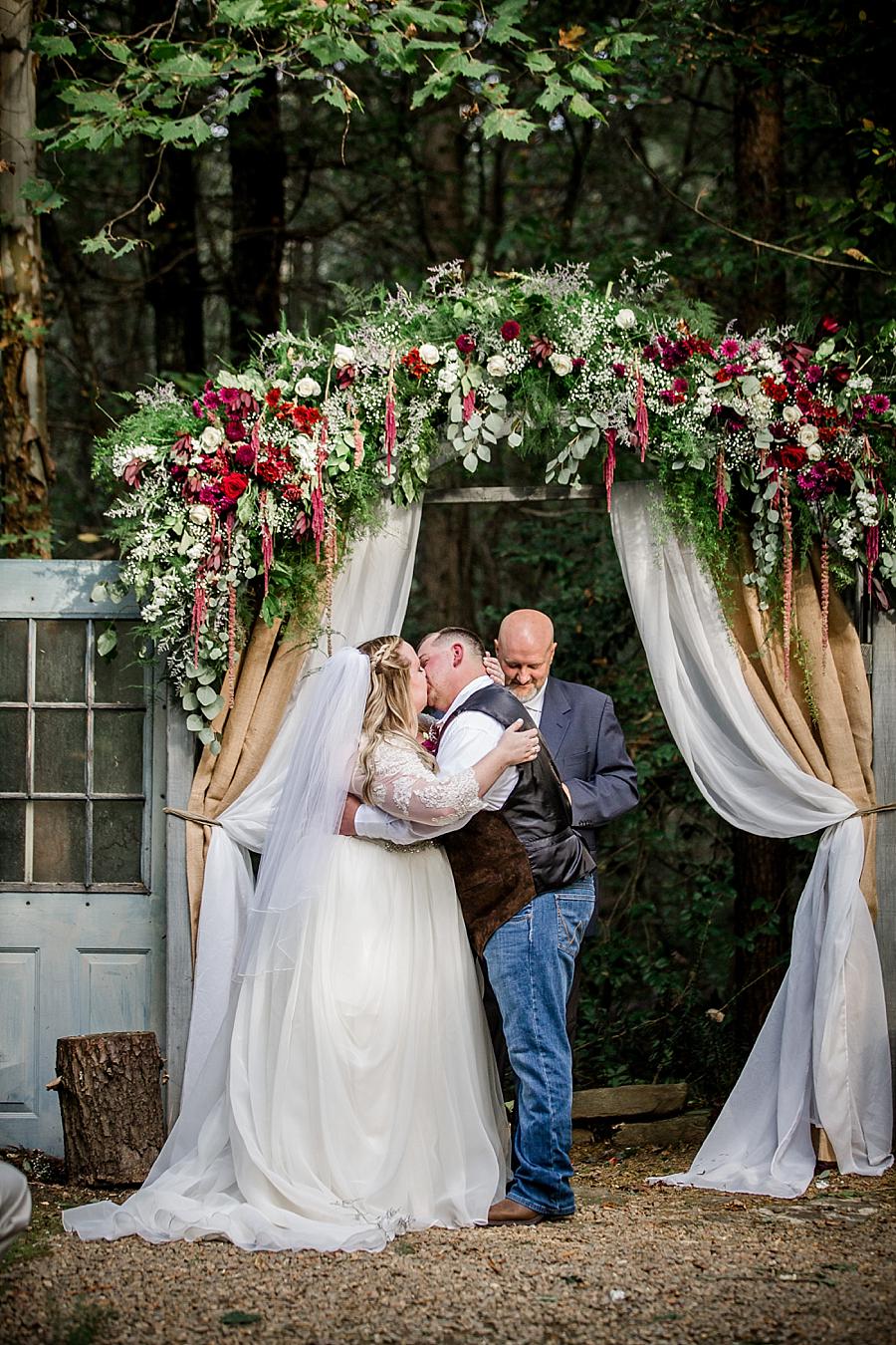 You may kiss the bride at this Sampson's Hollow Fall Wedding by Knoxville Wedding Photographer, Amanda May Photos.