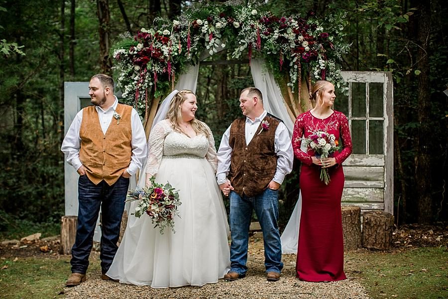 Looking at each other at this Sampson's Hollow Fall Wedding by Knoxville Wedding Photographer, Amanda May Photos.