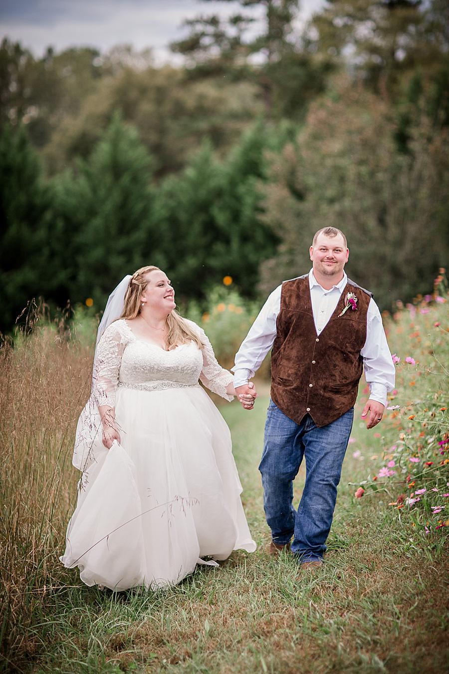 Walking together at this Sampson's Hollow Fall Wedding by Knoxville Wedding Photographer, Amanda May Photos.