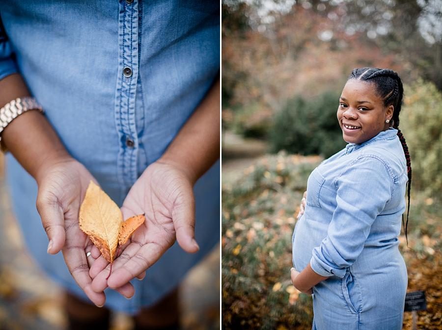 Holding leaves in her hands at this Hope Resource Maternity session at UT Gardens by Knoxville Wedding Photographer, Amanda May Photos.