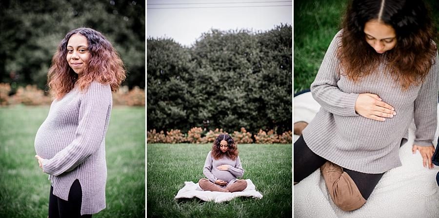 Sitting cross legged in the grass at this Hope Resource Maternity session at UT Gardens by Knoxville Wedding Photographer, Amanda May Photos.
