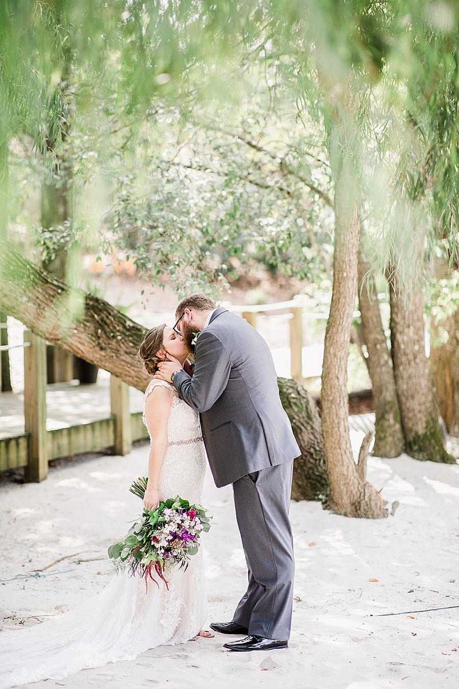 Kissing at this Hunter Valley Pavilion wedding by Knoxville Wedding Photographer, Amanda May Photos.