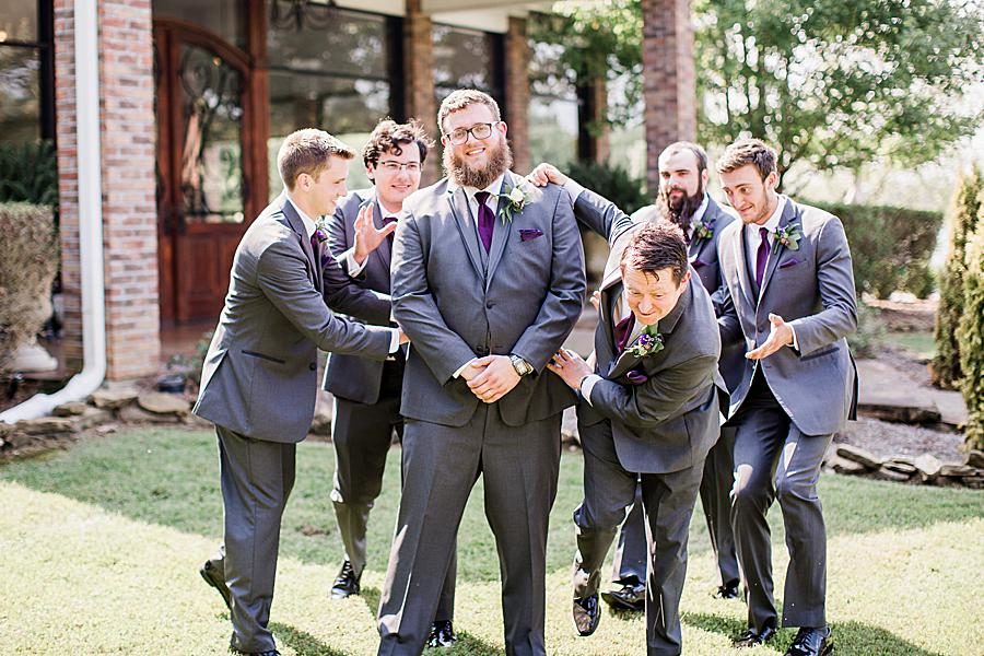 Groomsmen acting silly at this Hunter Valley Pavilion wedding by Knoxville Wedding Photographer, Amanda May Photos.