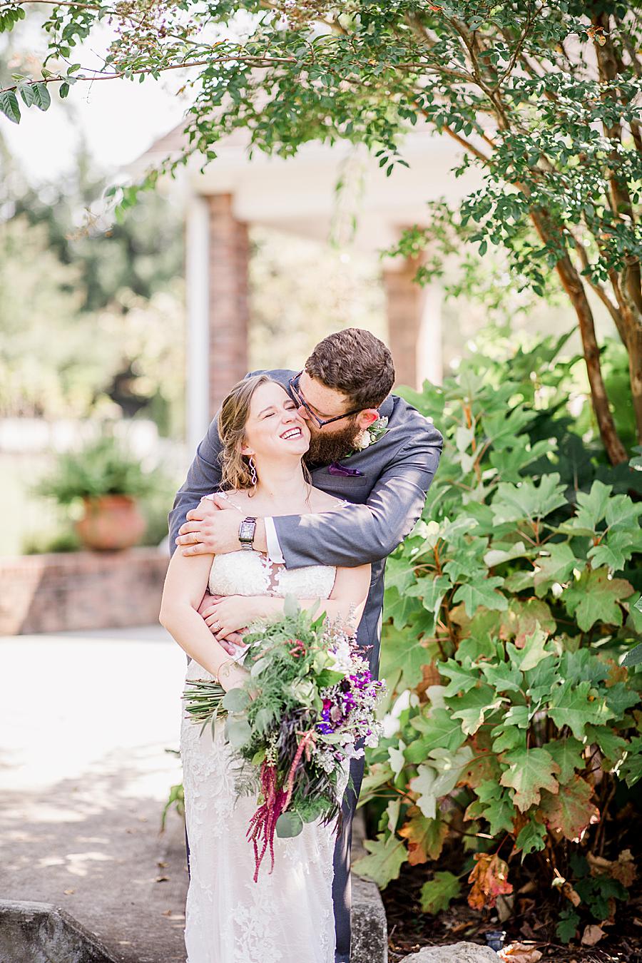 Kiss on the cheek at this Hunter Valley Pavilion wedding by Knoxville Wedding Photographer, Amanda May Photos.
