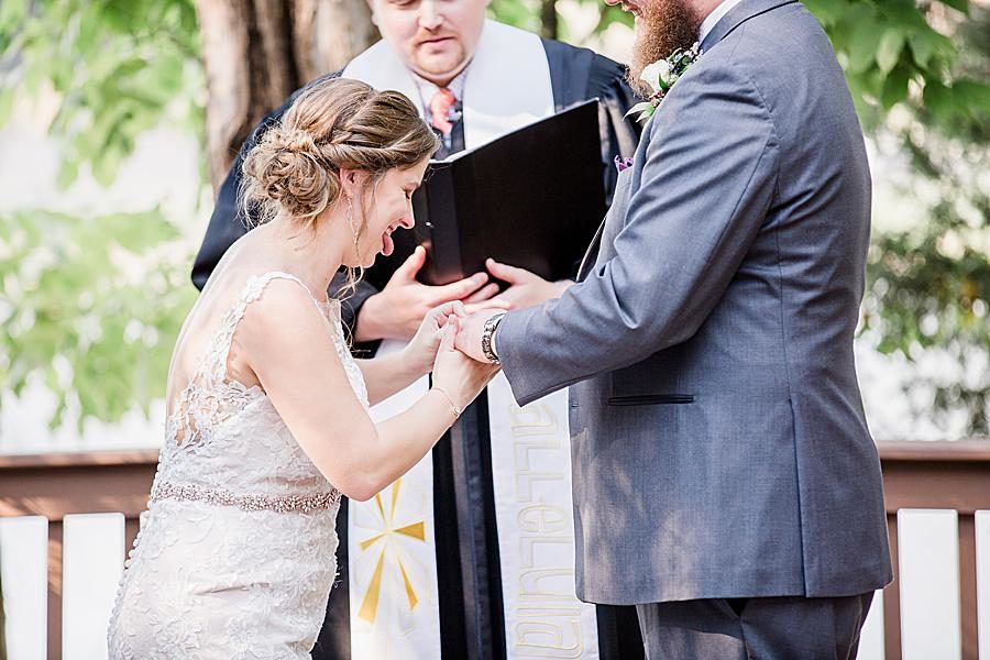 Exchanging rings at this Hunter Valley Pavilion wedding by Knoxville Wedding Photographer, Amanda May Photos.