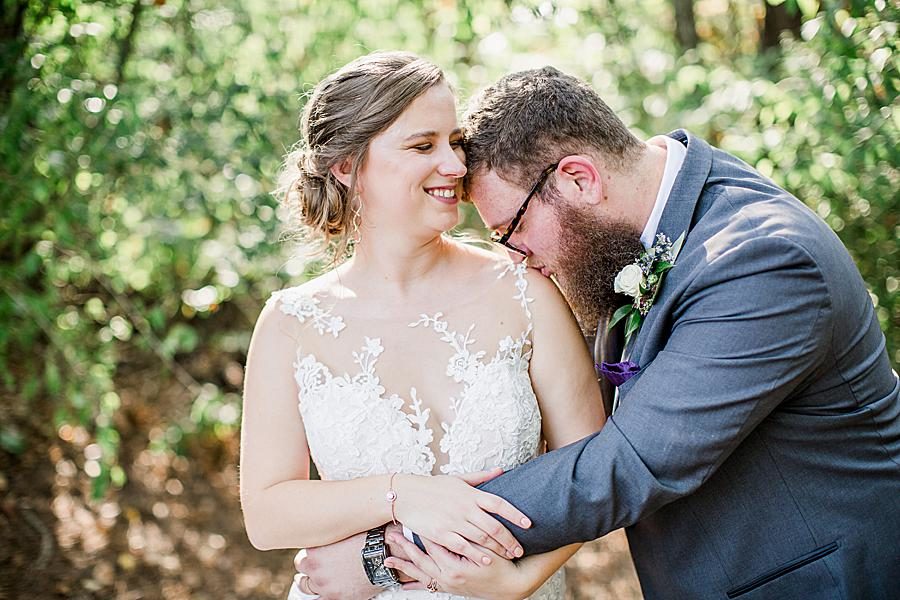 Kiss on the shoulder at this Hunter Valley Pavilion wedding by Knoxville Wedding Photographer, Amanda May Photos.