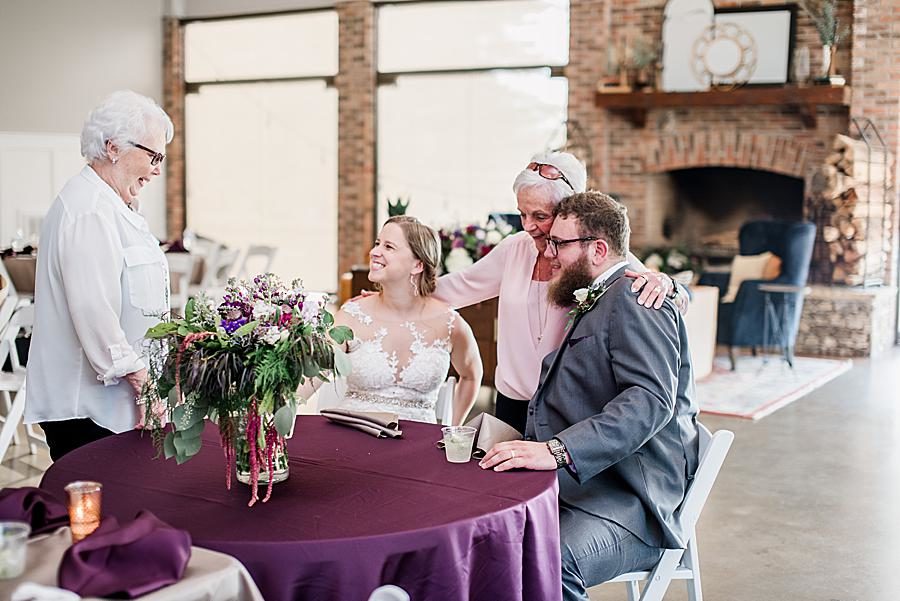Purple tablecloth by Knoxville Wedding Photographer, Amanda May Photos.