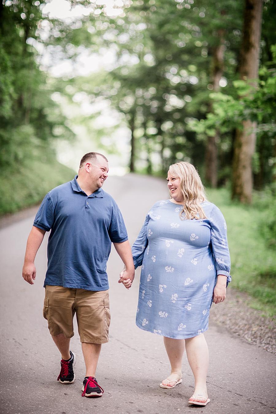 Holding hands at this Cades Cove Engagement by Knoxville Wedding Photographer, Amanda May Photos.