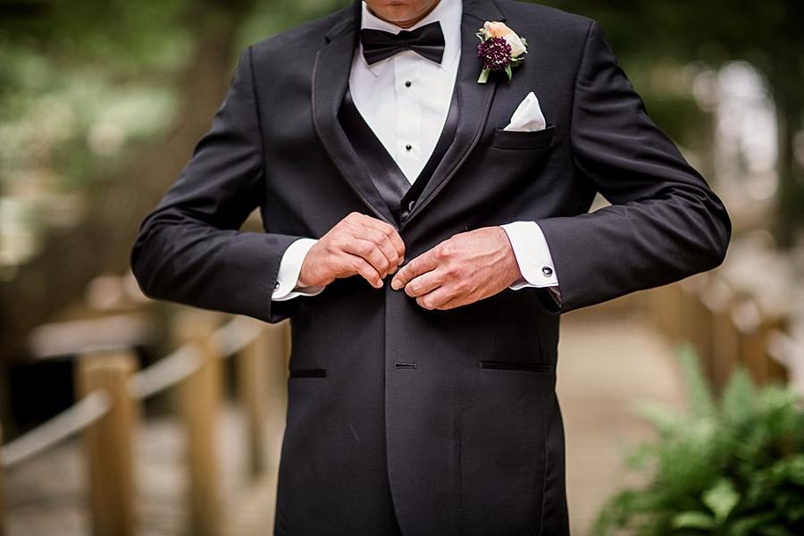 Buttoning the jacket at this Wedding at Hunter Valley Farm by Knoxville Wedding Photographer, Amanda May Photos.