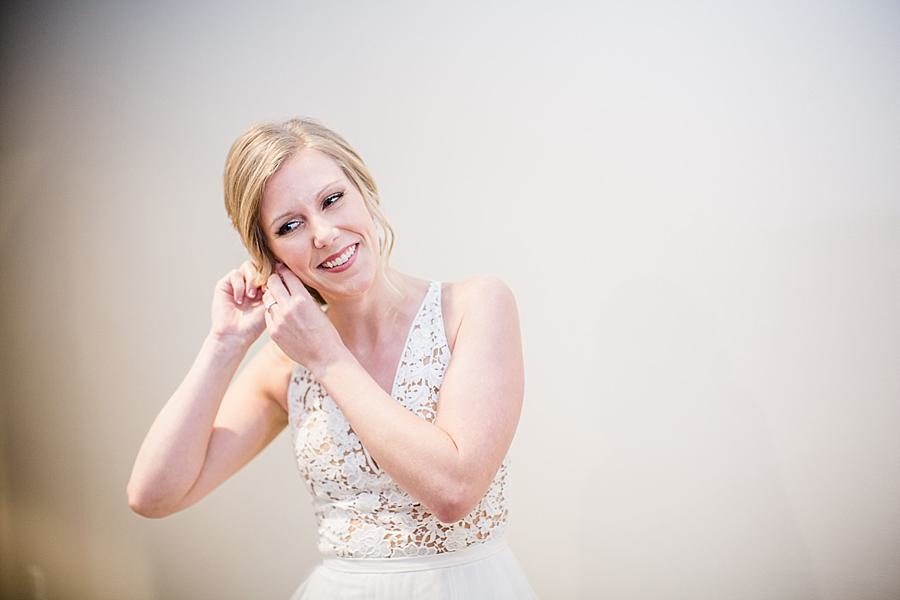 Earrings at this Upstairs at Midtown Wedding by Knoxville Wedding Photographer, Amanda May Photos.