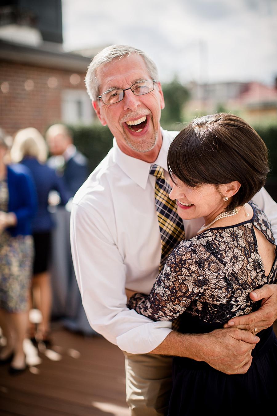 Parents of the groom at this Upstairs at Midtown Wedding by Knoxville Wedding Photographer, Amanda May Photos.
