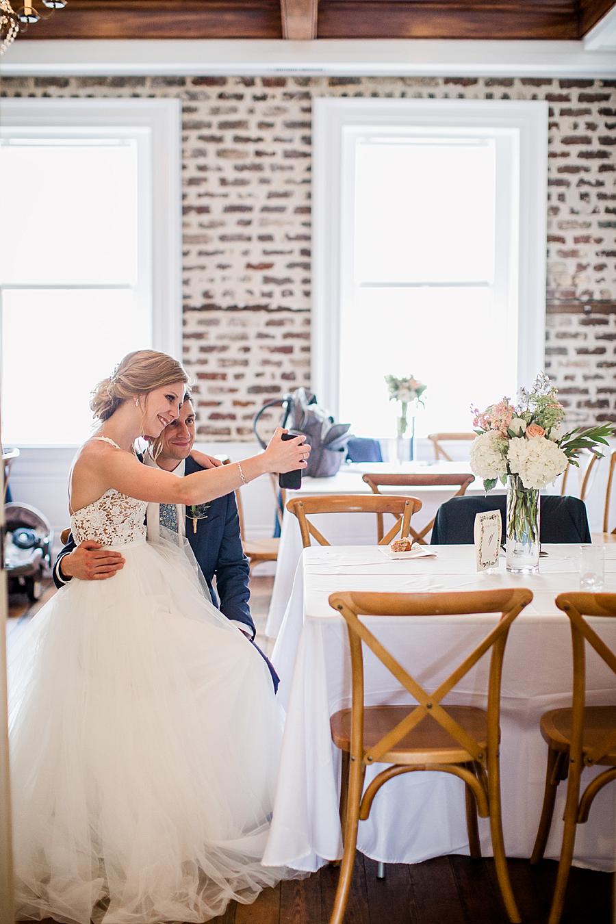 Taking a selfie at this Upstairs at Midtown Wedding by Knoxville Wedding Photographer, Amanda May Photos.