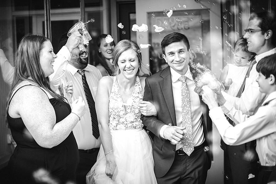 Bubble kiss at this Upstairs at Midtown Wedding by Knoxville Wedding Photographer, Amanda May Photos.