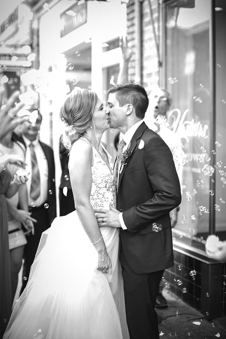 Kiss goodbye at this Upstairs at Midtown Wedding by Knoxville Wedding Photographer, Amanda May Photos.