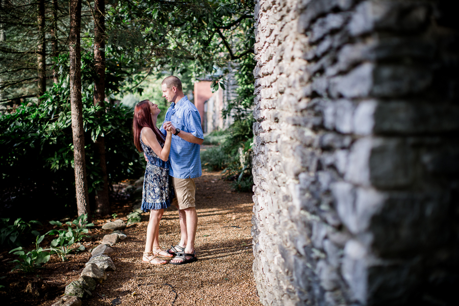 Slow dancing in the back at this Knoxville Botanical Gardens engagement session by Knoxville Wedding Photographer, Amanda May Photos.