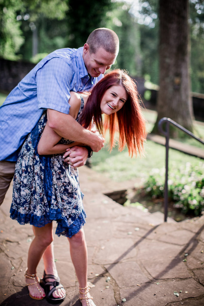 Playing with her at this Knoxville Botanical Gardens engagement session by Knoxville Wedding Photographer, Amanda May Photos.