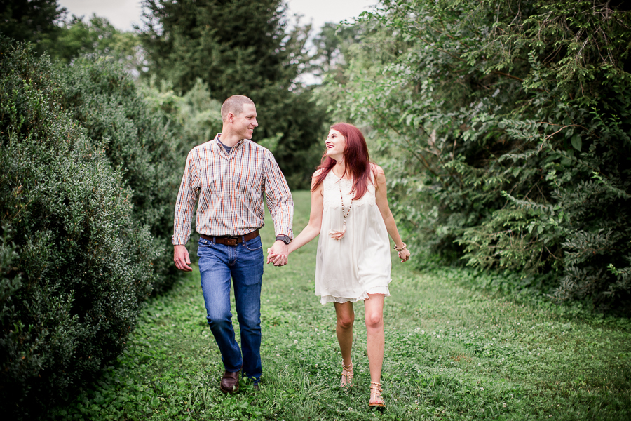 Walking towards the camera at this Knoxville Botanical Gardens engagement session by Knoxville Wedding Photographer, Amanda May Photos.