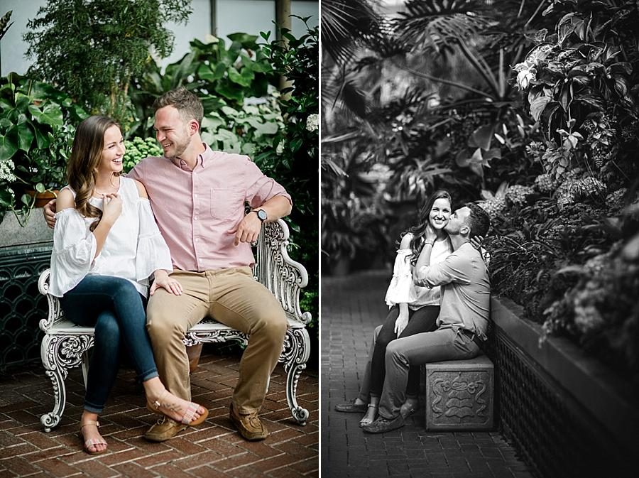 Sitting on a bench at this Biltmore Engagement by Knoxville Wedding Photographer, Amanda May Photos.