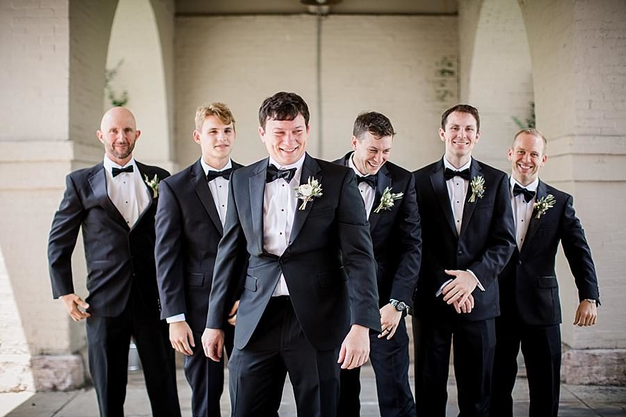 Groomsmen laughing at this Southern Railway Station Wedding by Knoxville Wedding Photographer, Amanda May Photos.
