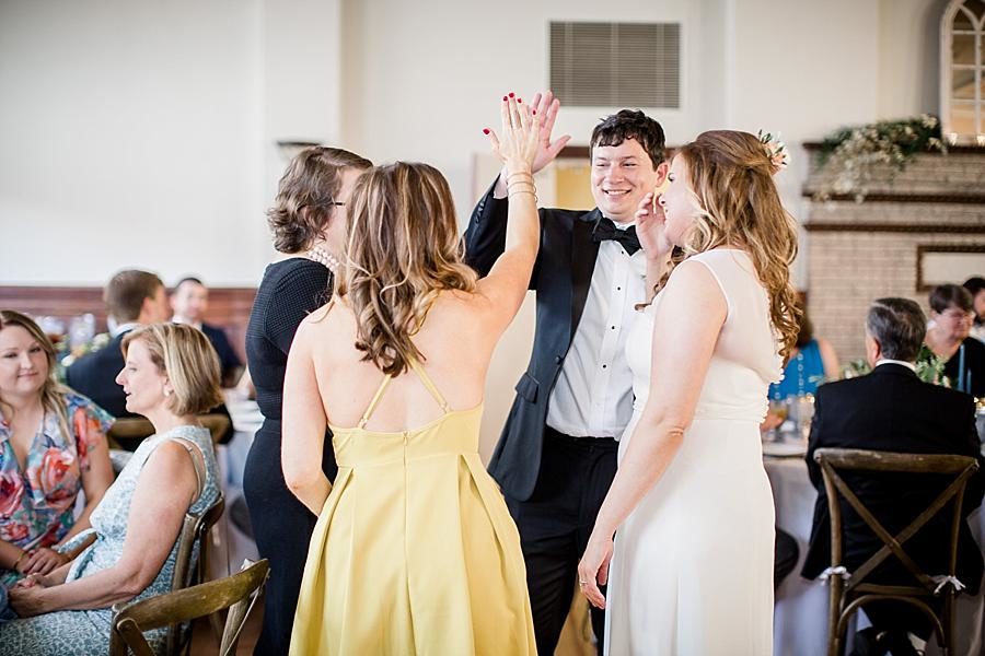 High five at this Southern Railway Station Wedding by Knoxville Wedding Photographer, Amanda May Photos.