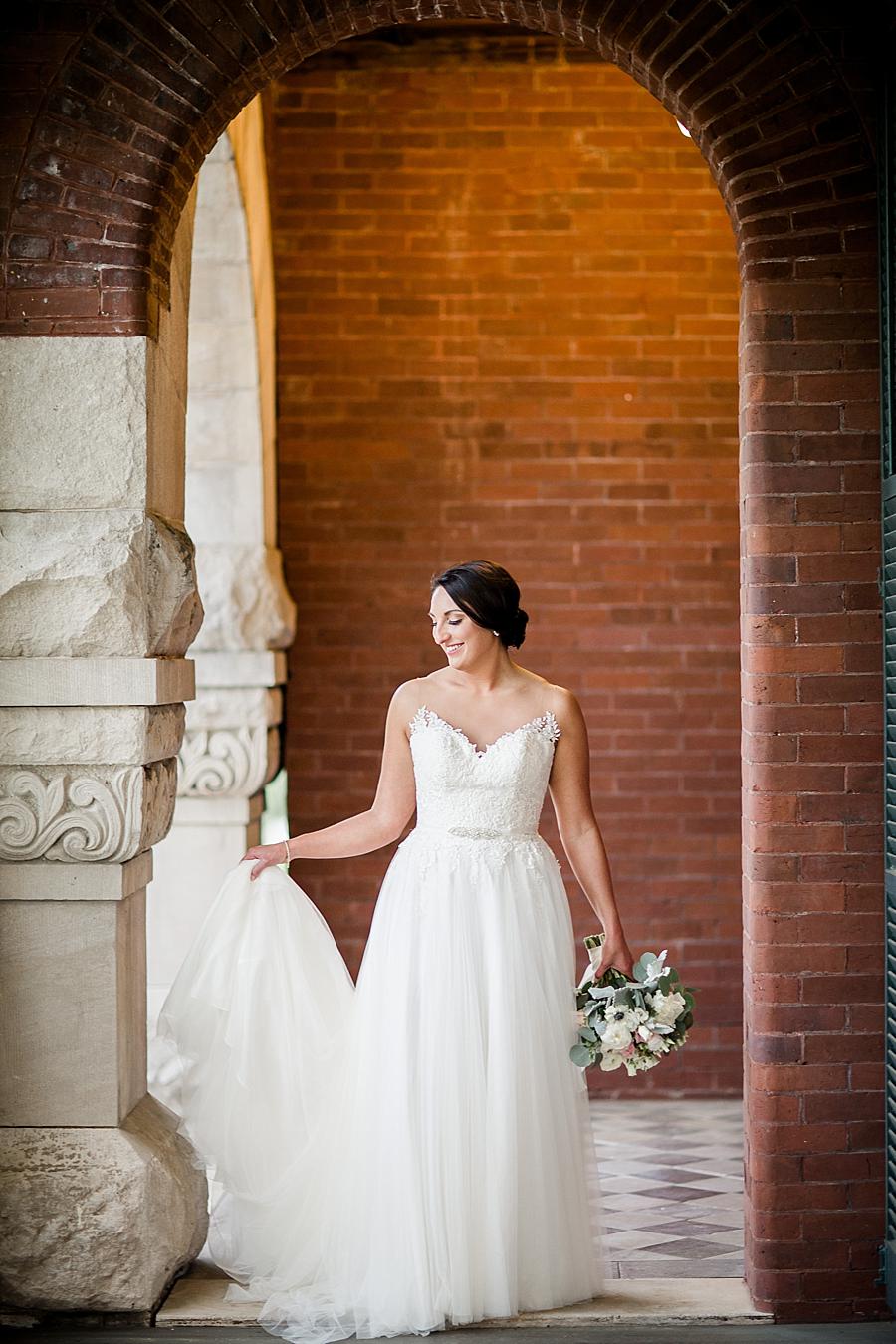 Under the arch at this Historic Westwood Bridal Session by Knoxville Wedding Photographer, Amanda May Photos.