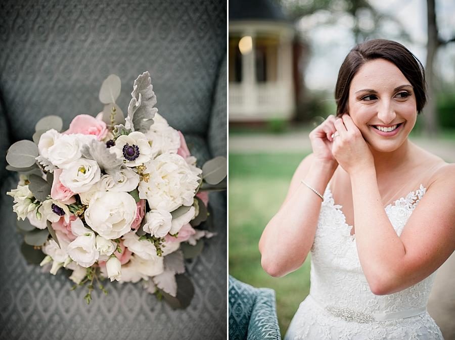 Putting on the earrings at this Historic Westwood Bridal Session by Knoxville Wedding Photographer, Amanda May Photos.