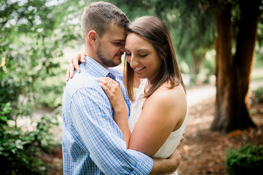 Holding and looking at her at this Estate of Grace engagement session by Knoxville Wedding Photographer, Amanda May Photos.