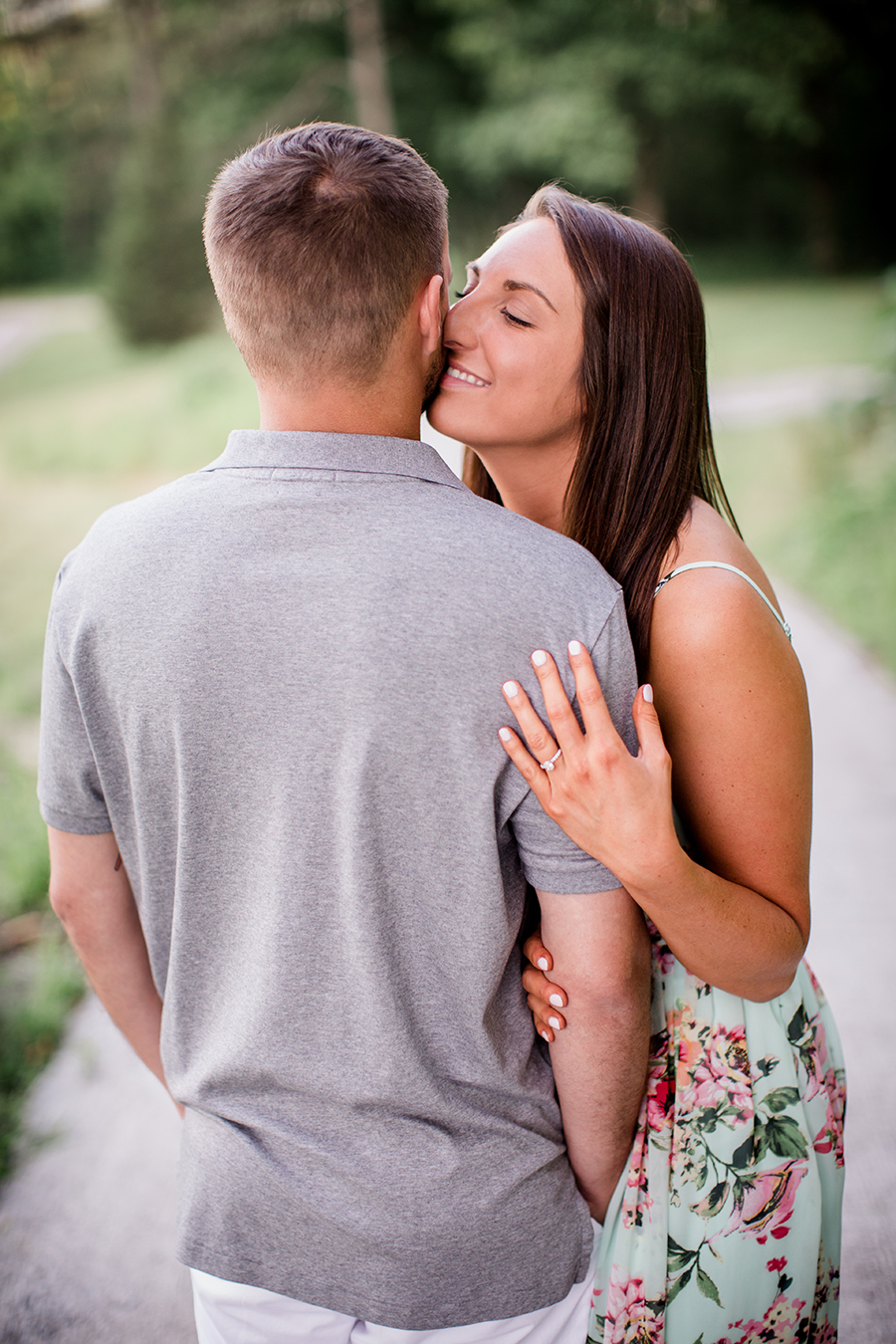 Kissing cheek at this Estate of Grace engagement session by Knoxville Wedding Photographer, Amanda May Photos.