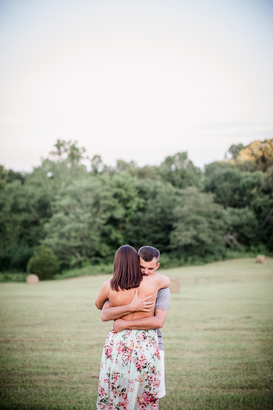 Hugging at this Estate of Grace engagement session by Knoxville Wedding Photographer, Amanda May Photos.