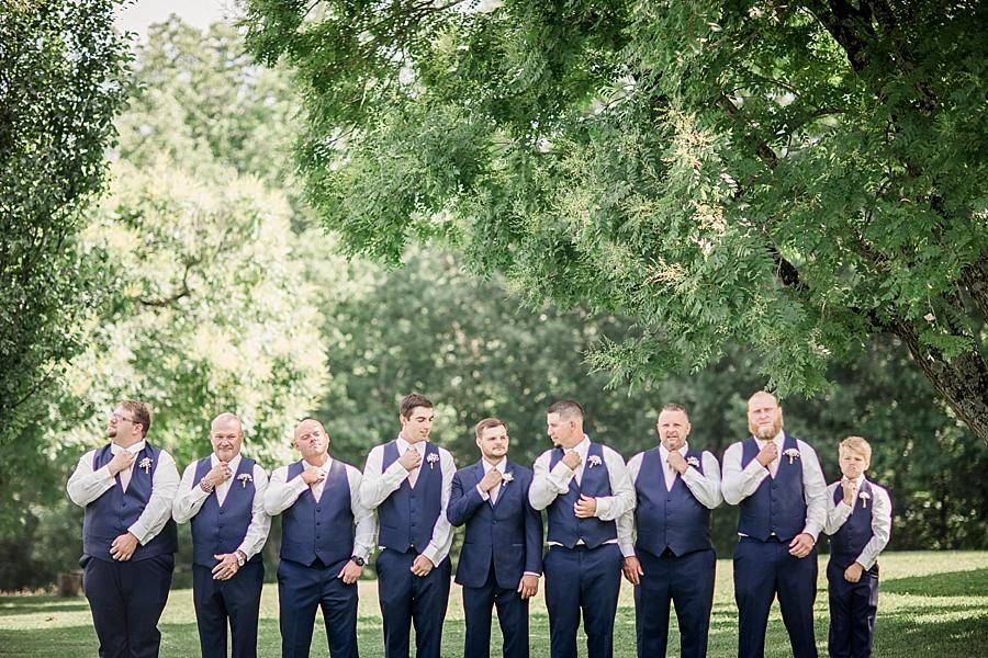 Straightening the ties at this Estate of Grace Wedding by Knoxville Wedding Photographer, Amanda May Photos.