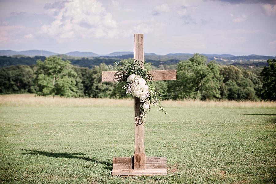 Flowers on a cross at this Estate of Grace Wedding by Knoxville Wedding Photographer, Amanda May Photos.