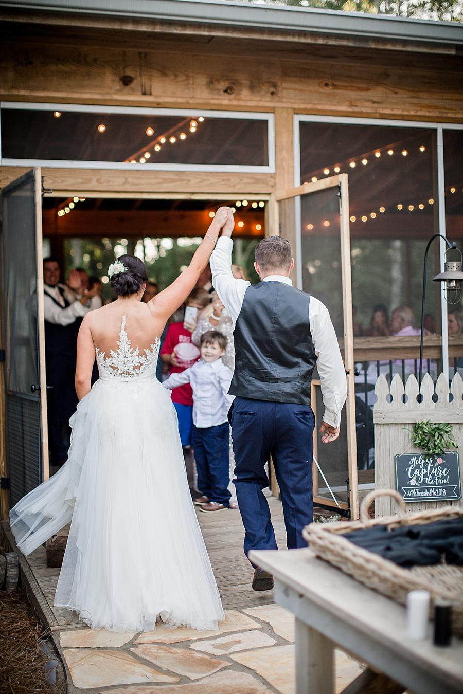 Hands raised at this Estate of Grace Wedding by Knoxville Wedding Photographer, Amanda May Photos.