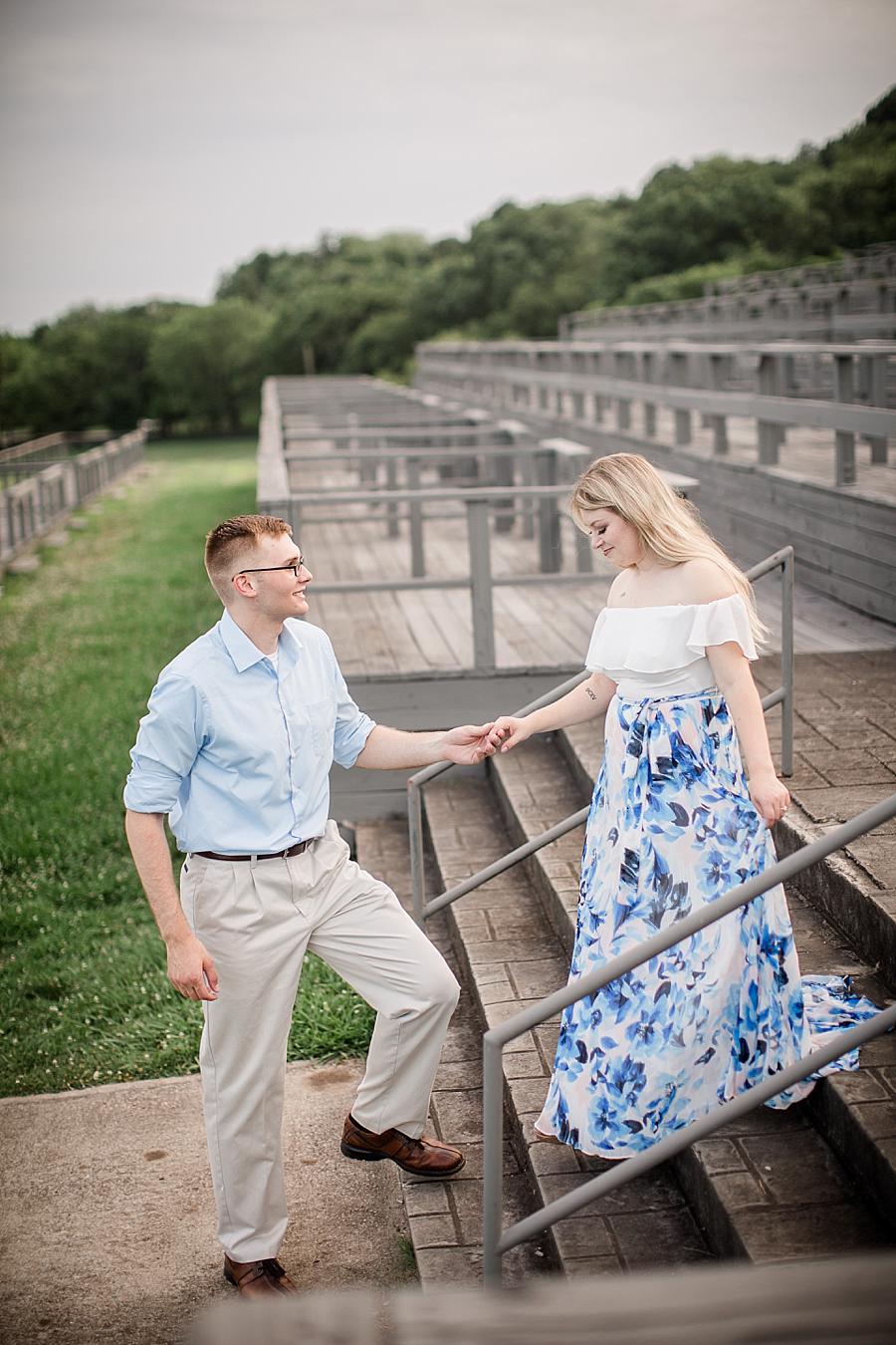 Walking down the stairs at this Percy Warner Engagement Session by Knoxville Wedding Photographer, Amanda May Photos.