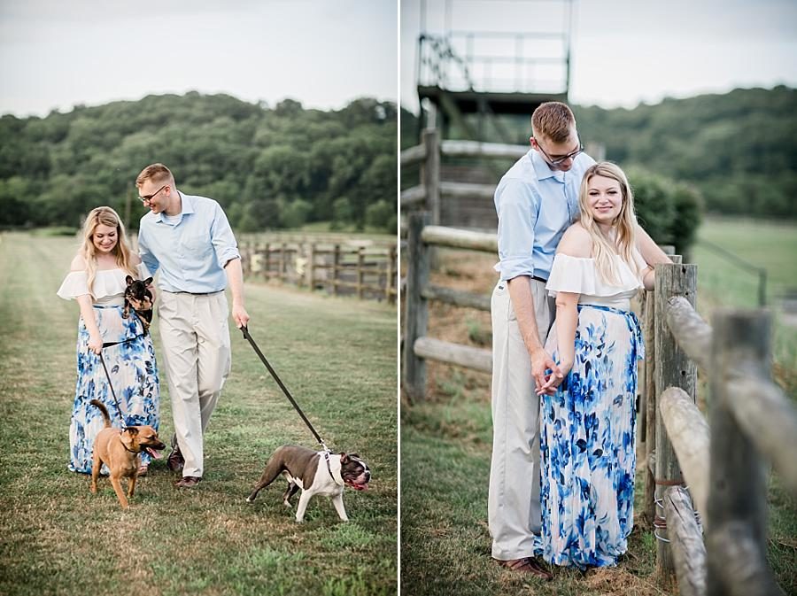 By the fence at this Percy Warner Engagement Session by Knoxville Wedding Photographer, Amanda May Photos.