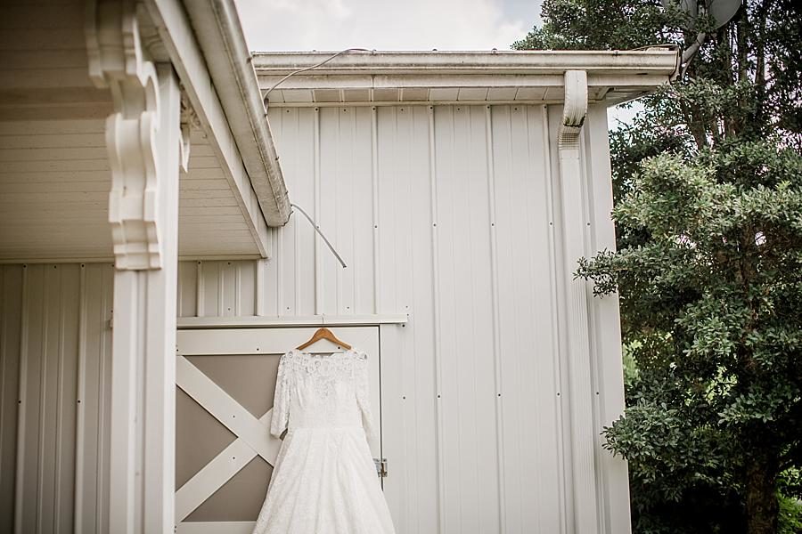 Hanging wedding dress at this Cheval Manor Wedding by Knoxville Wedding Photographer, Amanda May Photos.