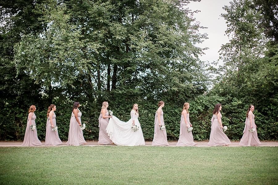Holding the train at this Cheval Manor Wedding by Knoxville Wedding Photographer, Amanda May Photos.