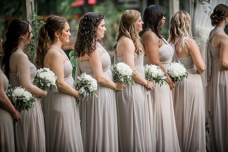 Bridesmaid at the ceremony at this Cheval Manor Wedding by Knoxville Wedding Photographer, Amanda May Photos.