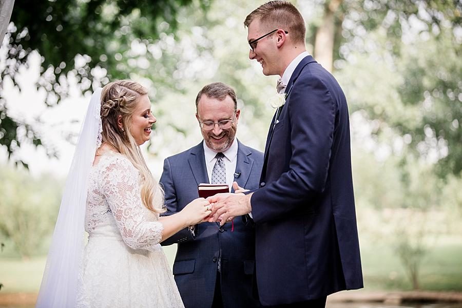 Exchanging rings at this Cheval Manor Wedding by Knoxville Wedding Photographer, Amanda May Photos.