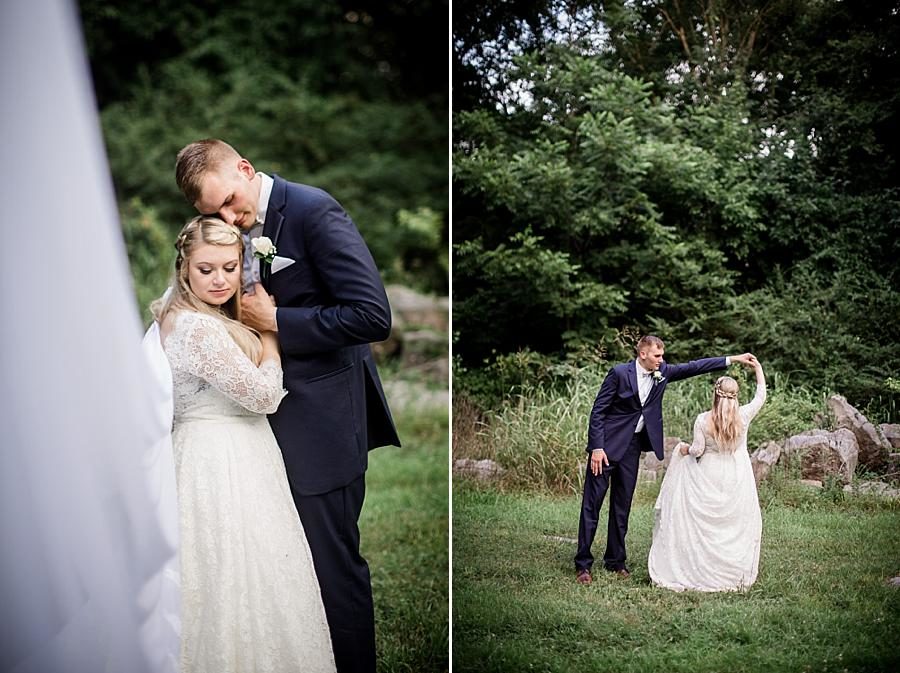 Twirling his bride at this Cheval Manor Wedding by Knoxville Wedding Photographer, Amanda May Photos.