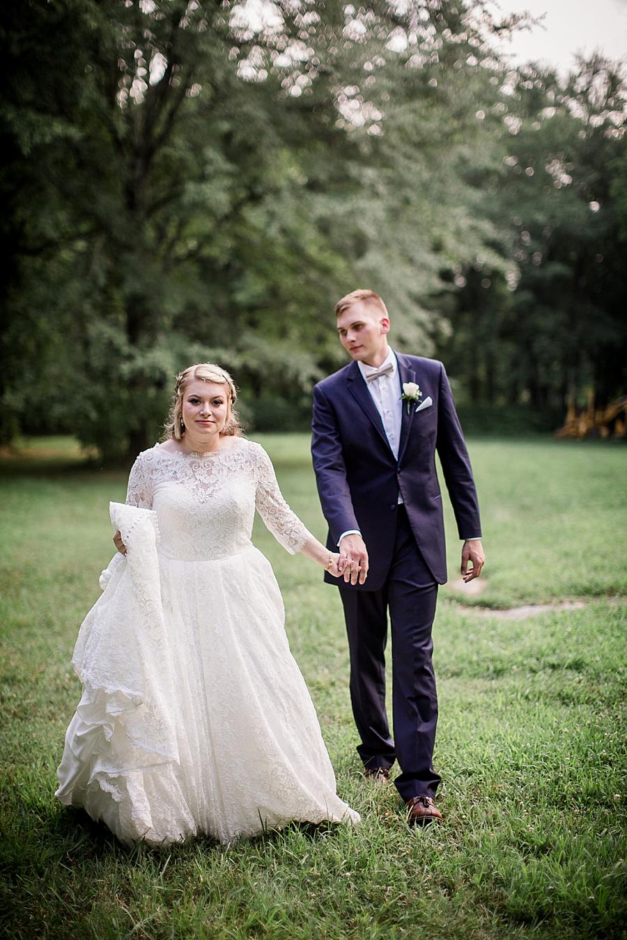 Leading her groom at this Cheval Manor Wedding by Knoxville Wedding Photographer, Amanda May Photos.