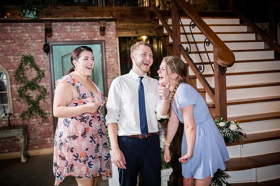 Guests laughing at this Cheval Manor Wedding by Knoxville Wedding Photographer, Amanda May Photos.