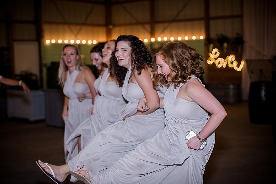 Bridesmaid kickline at this Cheval Manor Wedding by Knoxville Wedding Photographer, Amanda May Photos.