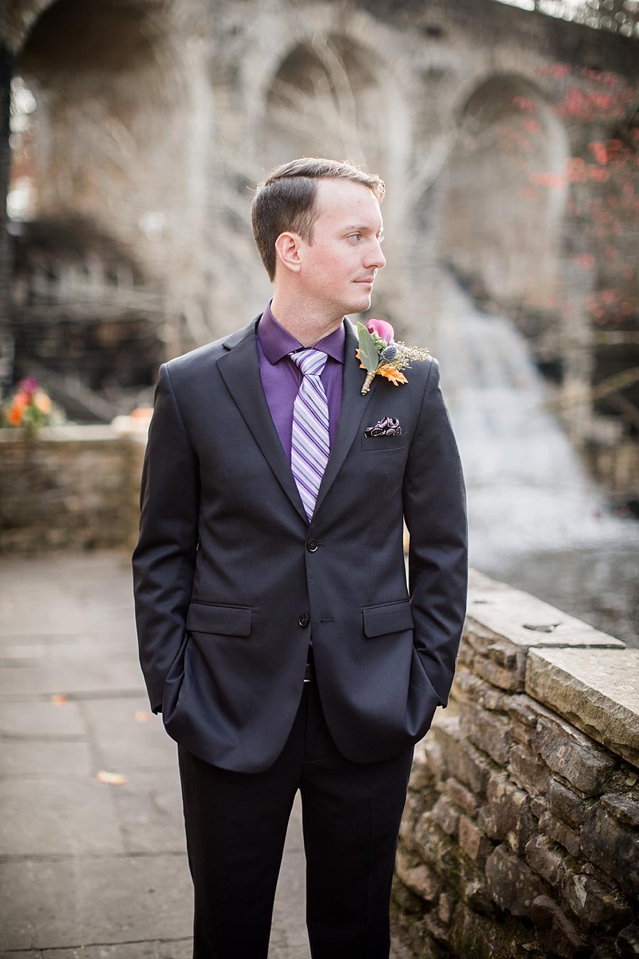 Groom looking sideways at this Cumberland Mountain State Park wedding by Knoxville Wedding Photographer, Amanda May Photos.