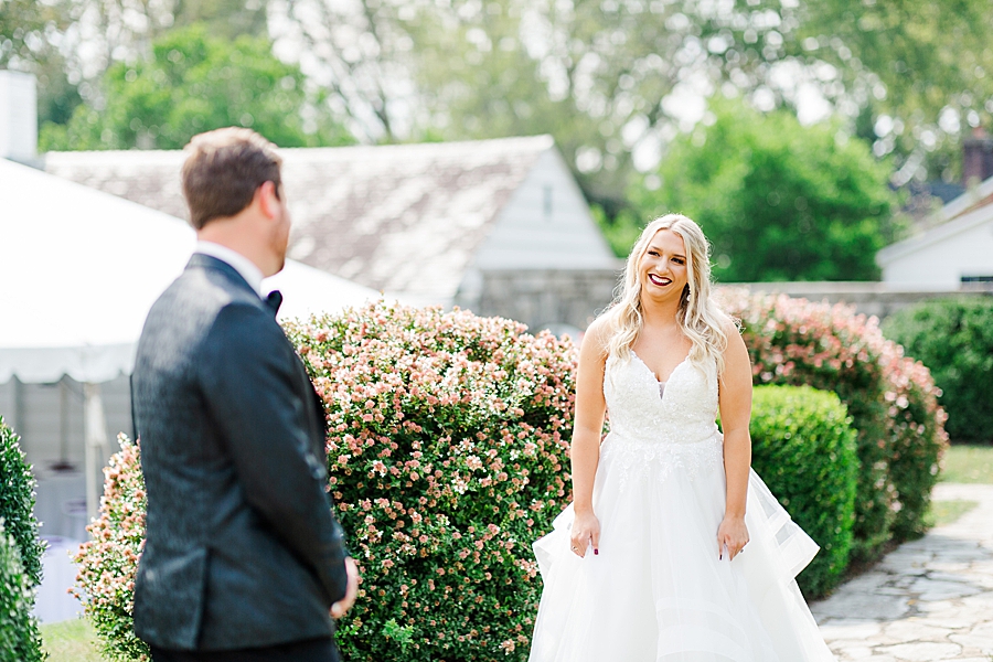 bride smiling at groom at this kincaid house wedding