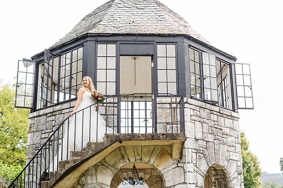 bride standing on stairway at this kincaid house wedding