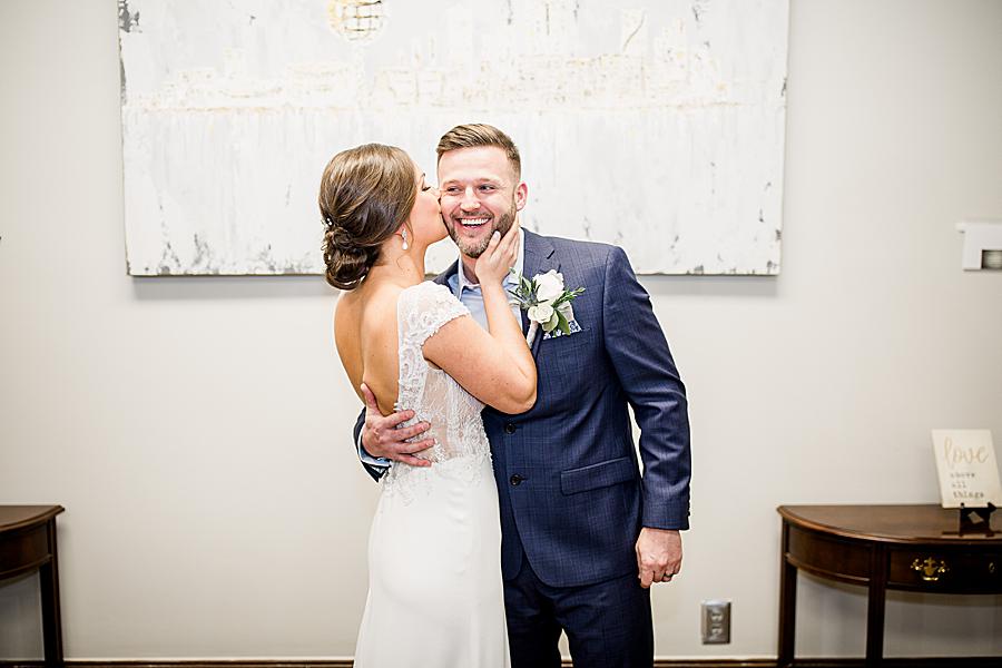 Kiss on the cheek at this Knox County Courthouse Wedding by Knoxville Wedding Photographer, Amanda May Photos.