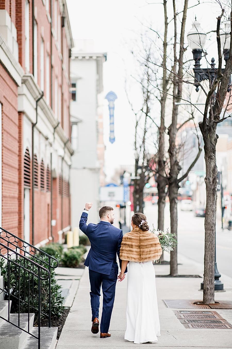 Fist pump at this Knox County Courthouse Wedding by Knoxville Wedding Photographer, Amanda May Photos.