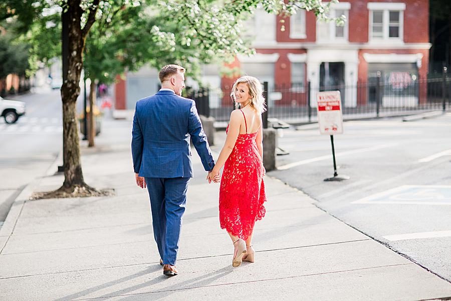 Holding hands at this Knoxville Botanical Gardens engagement by Knoxville Wedding Photographer, Amanda May Photos.